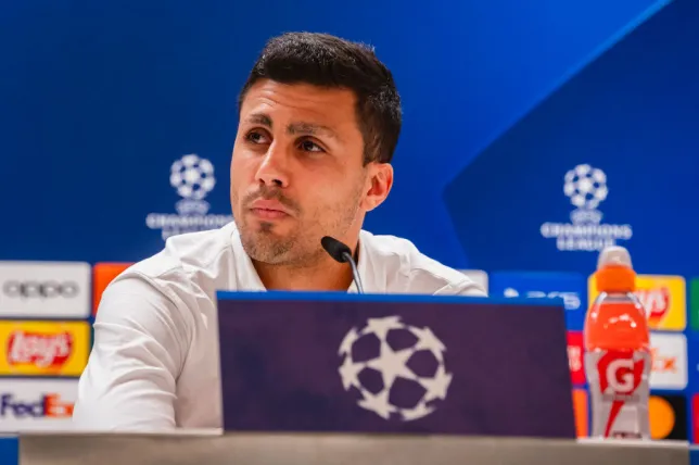 Rodri, Manchester City star, addresses Real Madrid transfer rumors and suggests potential player strike