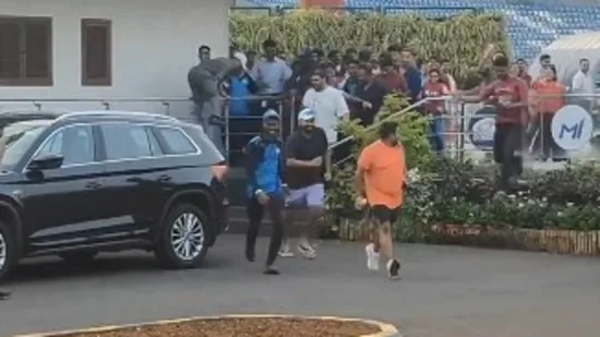 Rohit Sharma attempts to evade fans after they swarm training ground, only to be mobbed again by his Lamborghini